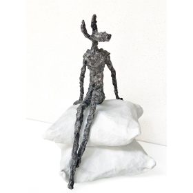 sculpture animalière sur oreillers