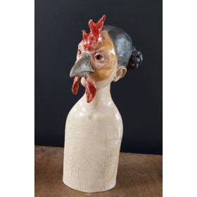 sculpture d'un buste masqué avec visage de coq