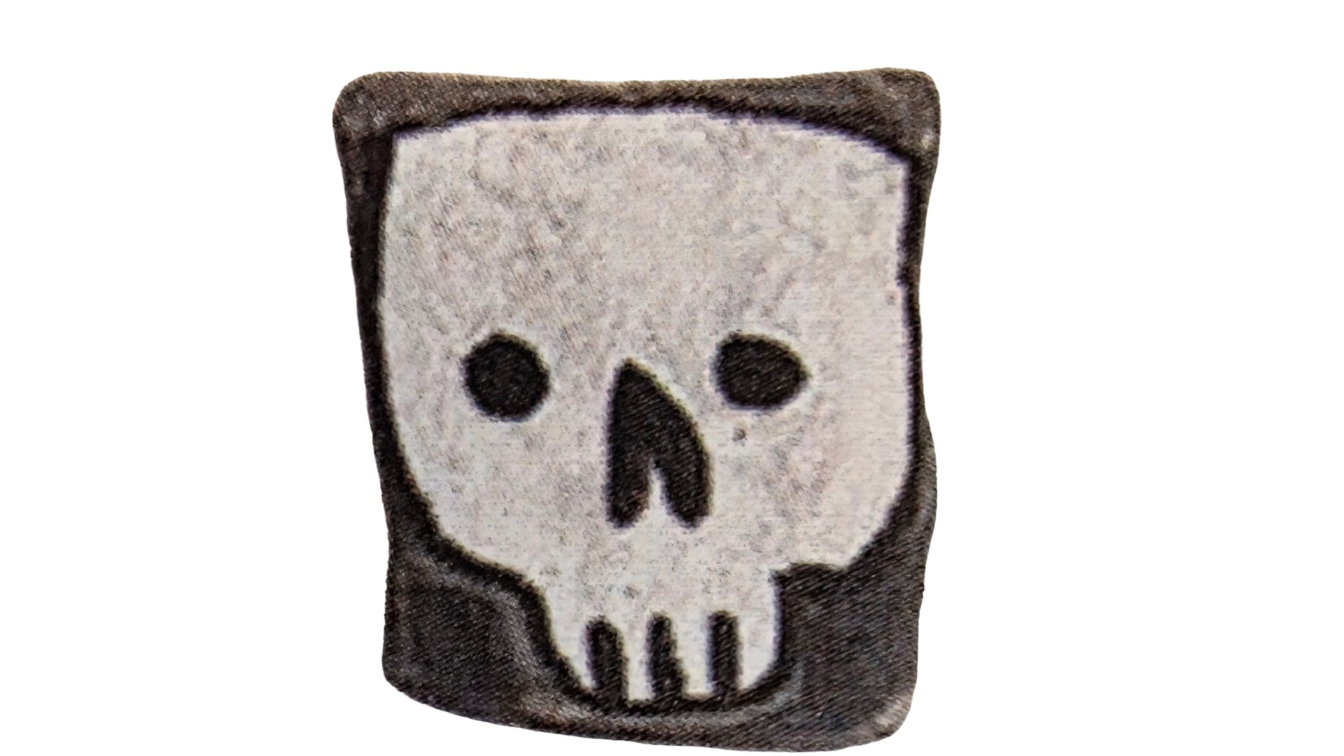 Poscas d'une tête de mort sur pavé de Berlin