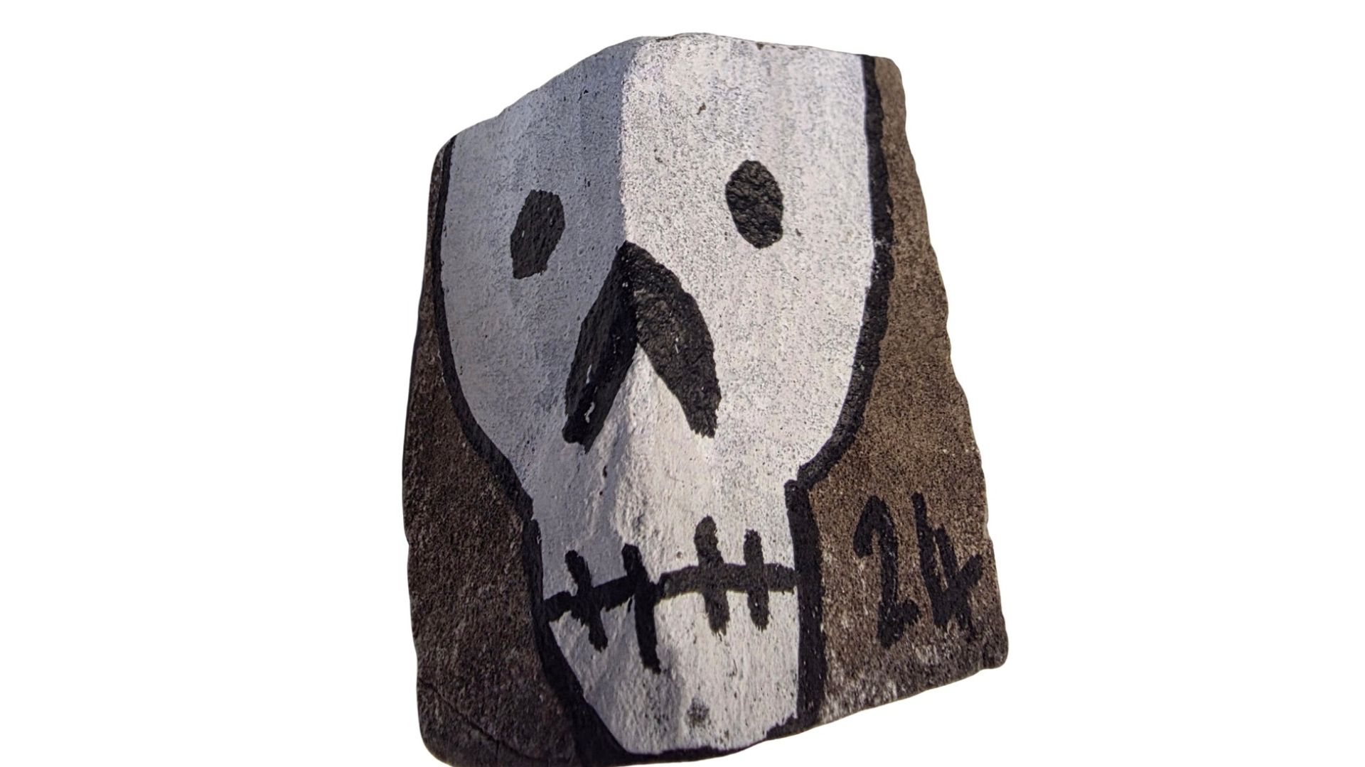 Poscas d'une tête de mort sur pavé de Berlin