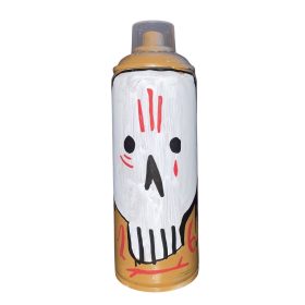 Bombe peinte sur fond orange avec visage de squelette, marques rouges et mauves